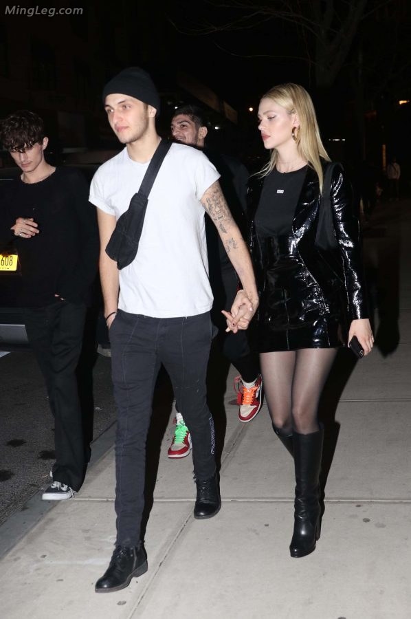 Nicola Peltz beautiful legs in black pantyhose and boots(29/29)