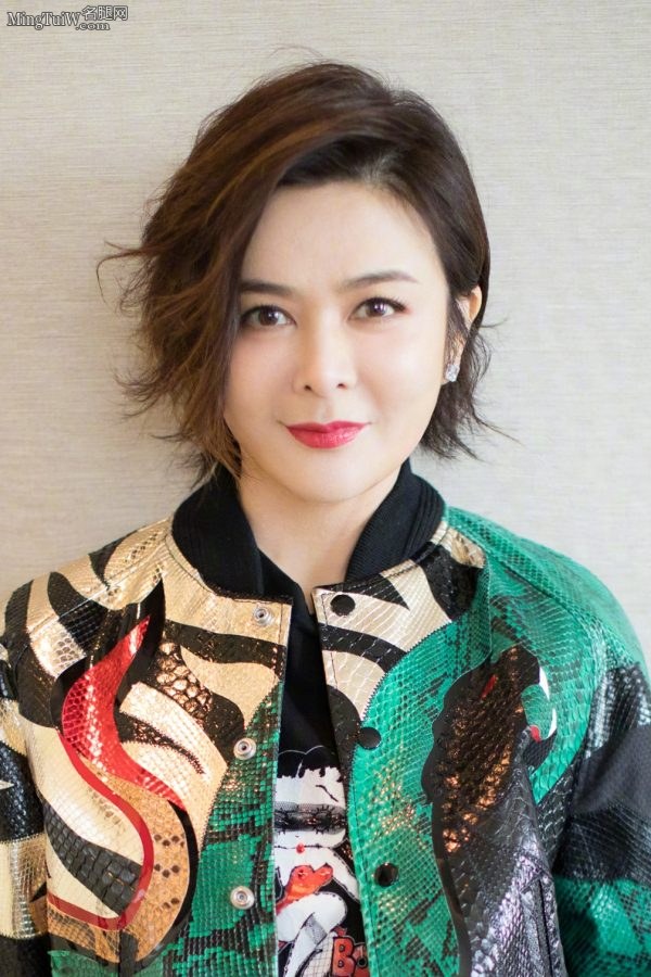 成熟美女明星关之琳紧身裤靴子身材真好(6/7)