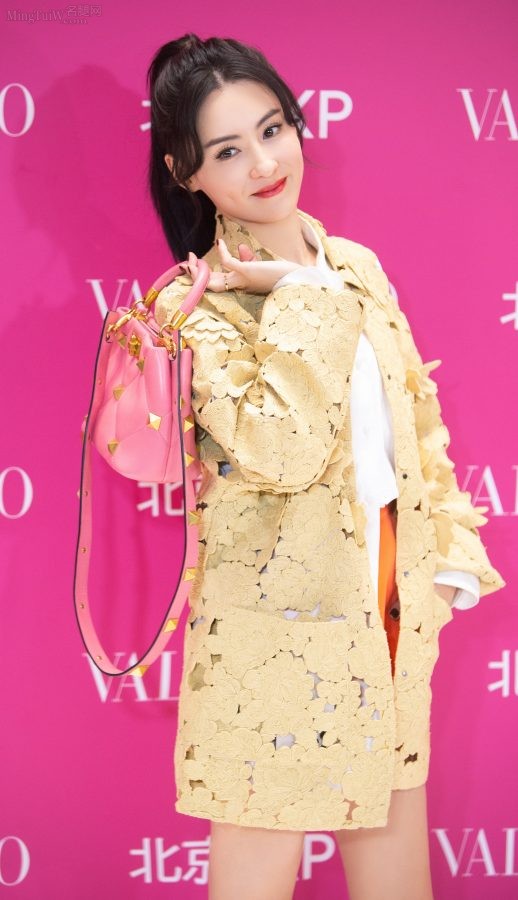 张柏芝马尾辫清新造型美腿细长(6/11)
