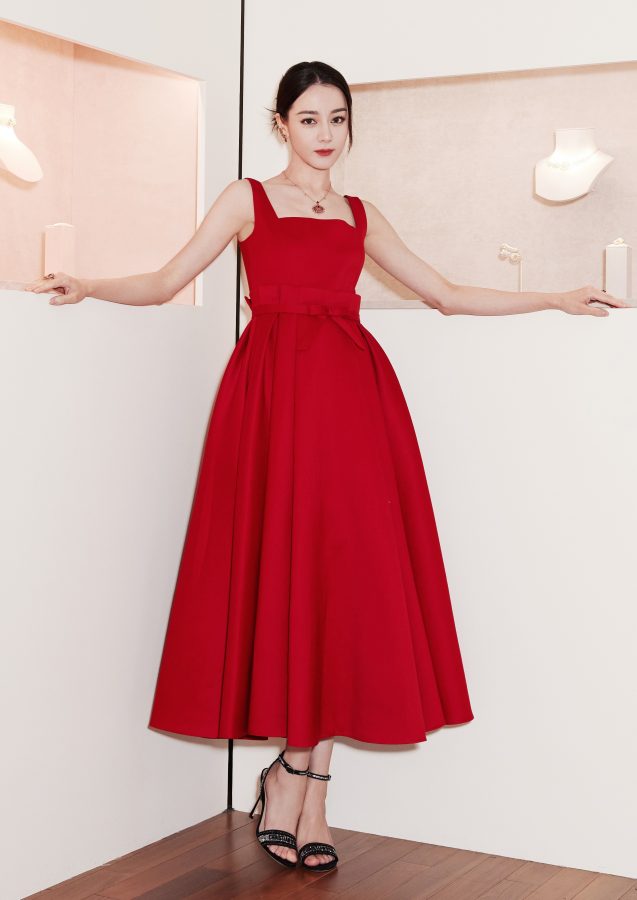 Dilraba is wearing a bright red dress and her beautiful feet are stunning in stiletto sandals(3/10)