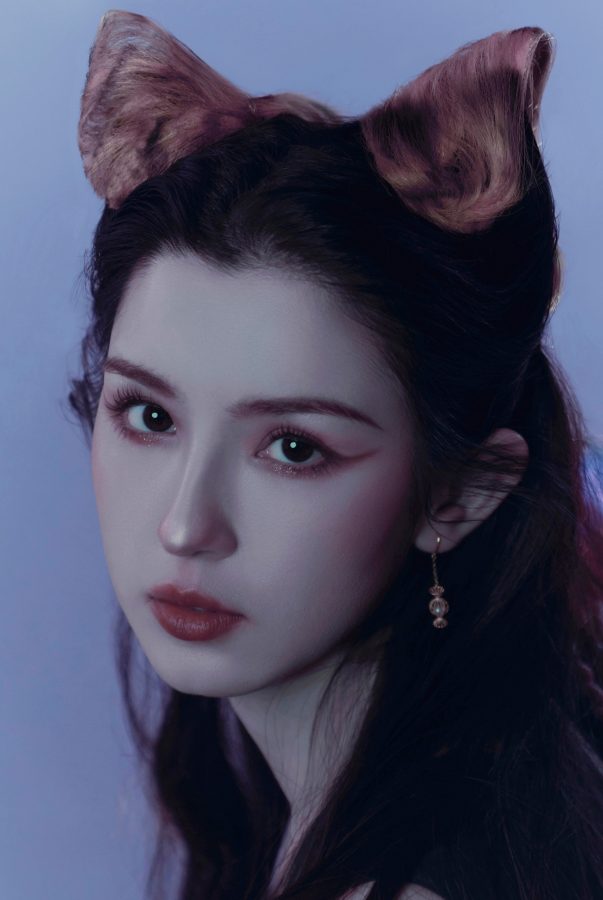 哈妮克孜变身猫女拍摄暗夜野性杂志大片(3/6)