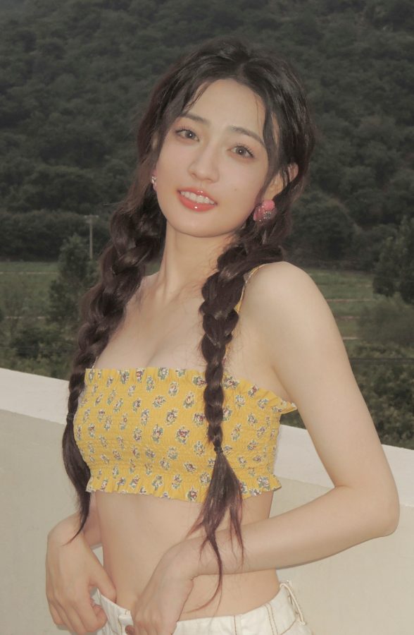 徐璐两条粗长的黑辫子尽显纯美(5/5)