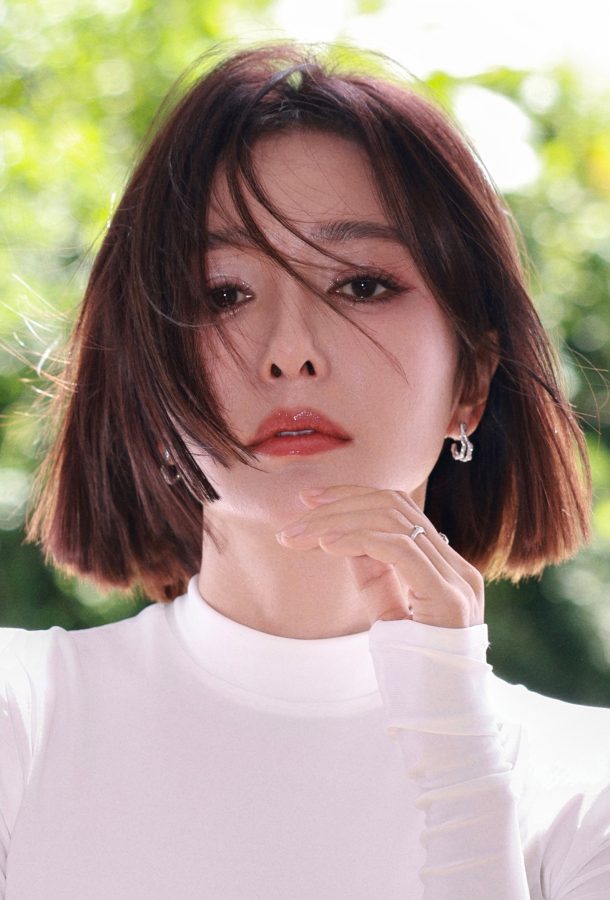 短发御姐秦岚穿一条洁白的开叉长裙露出完美玉足(9/9)