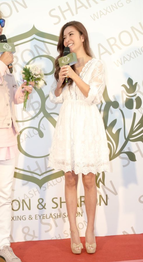 长腿美女许维恩白色蕾丝短裙衬托清纯(16/16)
